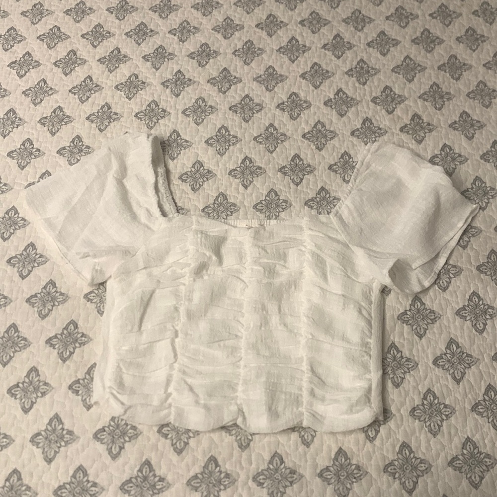 This is a shirt that could be used to go out at night or out for lunch